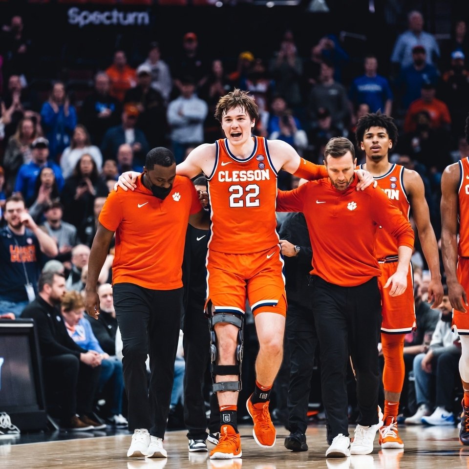 lemson forward Carter Welling being helped off court with torn ACL right knee injury during ACC Tournament 2026 a major blow ahead of Duke Clemson semifinal and March Madness