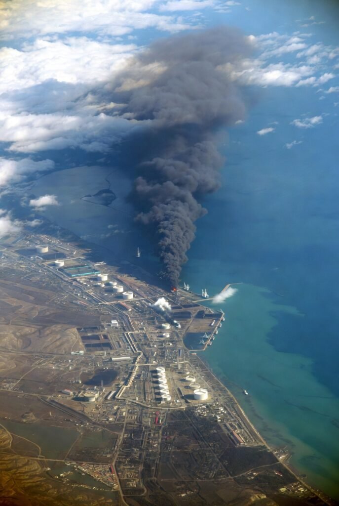 Aerial view of Novorossiysk port showing the Sheskharis oil terminal fire and smoke plume, April 2026