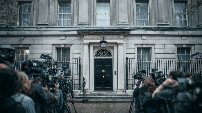 10 Downing Street exterior with press gathered amid UK political crisis 2026