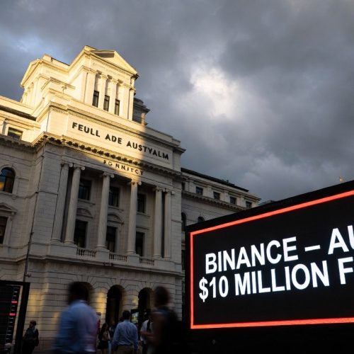 Binance fined $6.9 million Australia 2026 — Federal Court of Australia building in Sydney with digital display showing Binance ASIC penalty ruling, representing the Binance Australia derivatives case and global crypto regulation enforcement