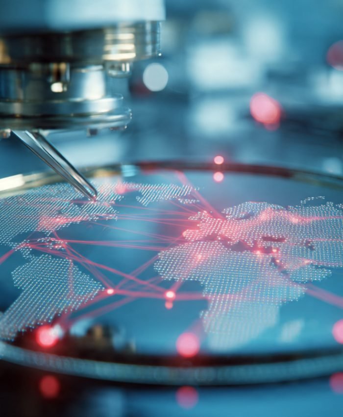 Semiconductor wafer inside a cleanroom during the 2026 chip supply chain crisis — global trade route disruptions highlighted on a digital map overlay