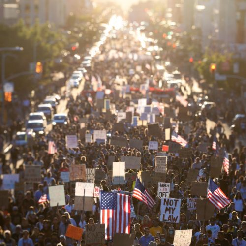 US protest wave 2026 — aerial drone view of millions of Americans marching in the No Kings nationwide protest on March 28 2026 across all 50 states, the largest political demonstration in US history against Trump administration policies